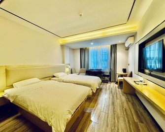 Guilin Tree Hotel - Guilin - Camera da letto