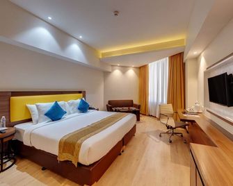 Amarpreet, Chhatrapati Sambhajinagar - Am Hotel Kollection - Aurangábád - Ložnice
