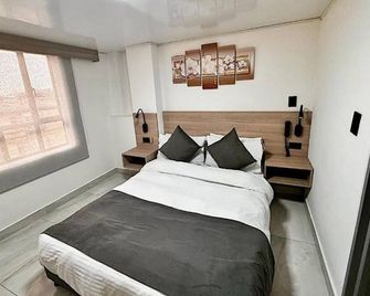 هوتل فينيكس ريال - بوغوتا - غرفة نوم