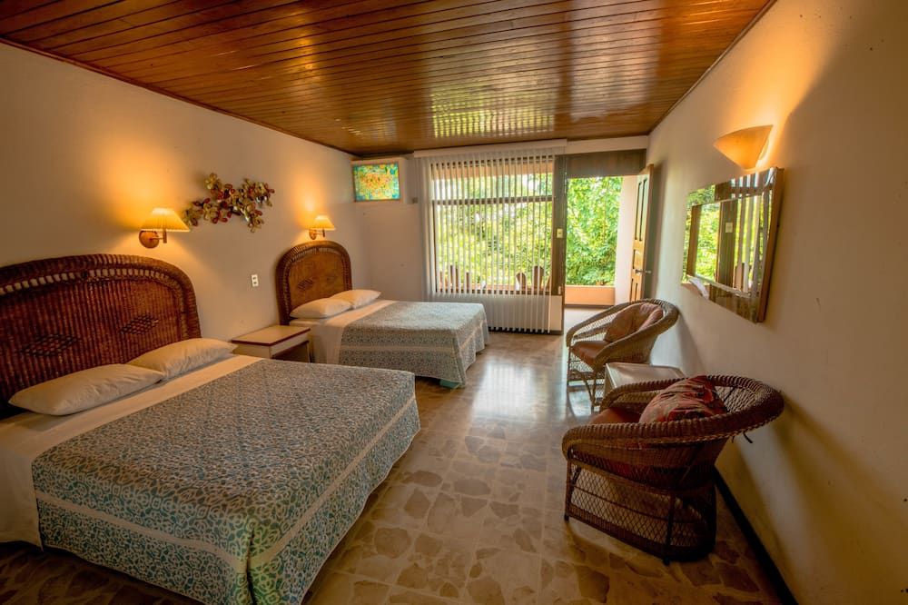 Karahe Beach Hotel - מנואל אנטוניו - חדר שינה