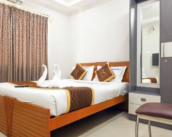 R-hotels Rithikha Inn porur - צ'נאי - חדר שינה