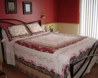 Hotel Sous La Croix - Tadoussac - Quarto