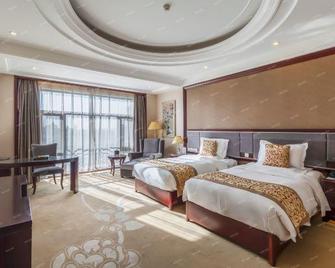 Cangzhou Huanghua Shengtai mingdun Hotel - Cangzhou - Habitación