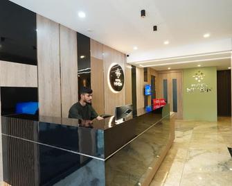 Hotel Hive Inn - Kozhikode - Kozhikode - Front desk