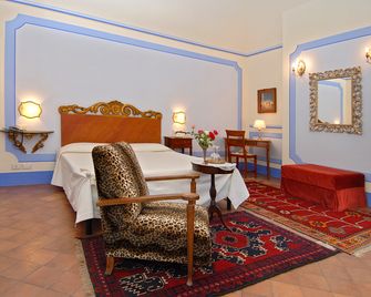 Il Rondò Boutique Hotel - מונטפולצ'אנו - חדר שינה