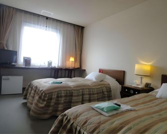 Nakajo Grand Hotel - Tainai - Bedroom