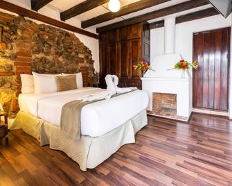 El Carmen Hotel - אנטיגואה גוואטמלה - חדר שינה