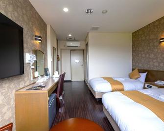 Central Hotel Takahagi - Takahagi - Camera da letto
