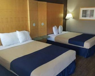 Woodberry Inn & Suites By OYO Rome - Roma - Yatak Odası