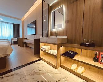 City Langcheng Hotel - Ürümqi - Quarto