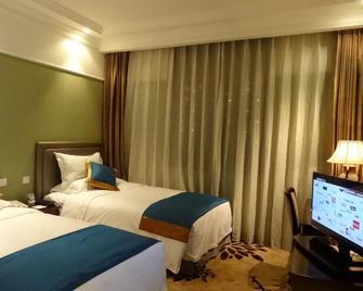 Datong Hotel - Datong - Schlafzimmer