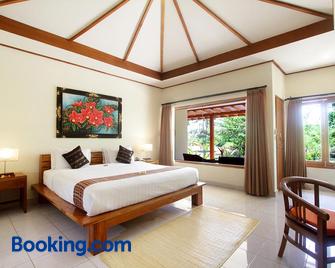 Puri Sari Beach Hotel - Labuan Bajo - Habitación