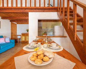 Affittasardegna - Caraibi Apartments - Pittulongu - Essbereich
