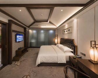 Yuhong Hotel - Š-jen - Ložnice