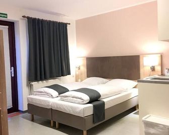 Hana Aparthotel - Glinde - Schlafzimmer