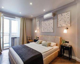 Minsk2go Apartments - مينسك - غرفة نوم