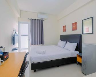 Studio Apartment Bogorienze near The Jungle Water Adventure By Travelio - Bogor - Bedroom