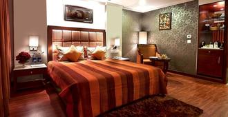 The Golden Plaza Hotel & Spa - Chandigarh - Bedroom