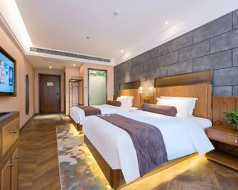 James Joyce Coffetel (Tianjin Binhai International Airport Armed Police Hospital) - Tientsin - Camera da letto