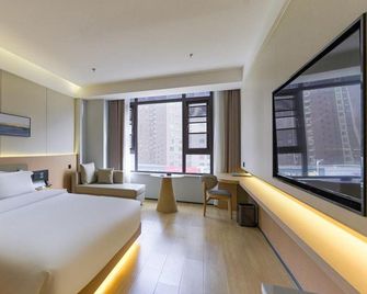 Yilai Siji Hotel - Xinxiang - Спальня