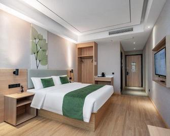 Green Tree Inn Zhejiang Shaoxing East Station - Shaoxing - Schlafzimmer