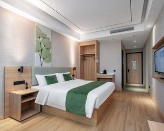 Green Tree Inn Zhejiang Shaoxing East Station - Shaoxing - Schlafzimmer