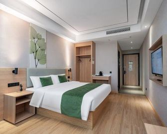 Green Tree Inn Zhejiang Shaoxing East Station - שאושינג - חדר שינה