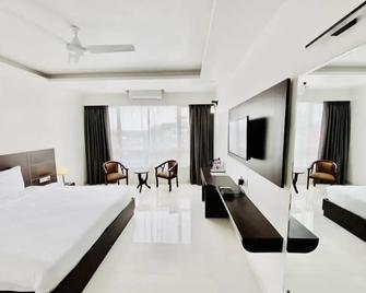 Bsg Absolute Porvorim Regency Goa Hotel - Panadží - Ložnice