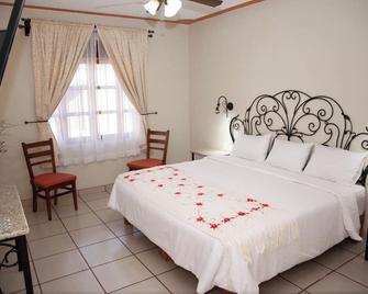 Encanto de la Sierra Hotel - Mascota - Habitación