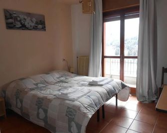 Hotel Garnì Alta Valle - 비오네 - 침실