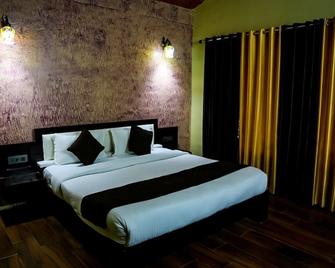 V Resorts Jungle Pool Khurpatal - Nainital - Schlafzimmer