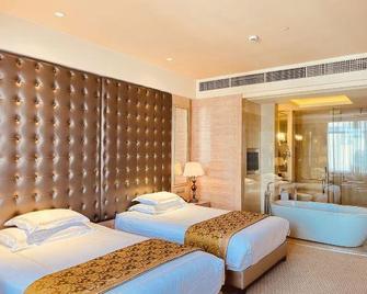 Yihao Hotel - Ganzhou - Спальня