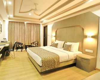 Crown Plaza Residency - Srinagar - Slaapkamer