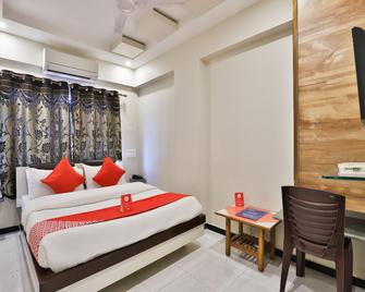 Hotel O Nova Hotel Nildeep - Rajkot - Bedroom