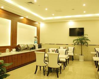 Greentree Inn Jiangxi Shangrao Wuyuan Bus Station Tang Village Express Hotel - Shangrao - Ресторан