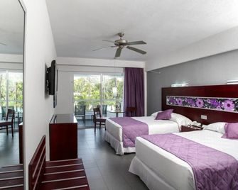 Riu Naiboa Hotel - Punta Cana - Schlafzimmer
