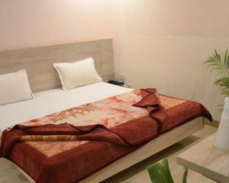 Hotel Kachnar - Pachmarhi - Bedroom