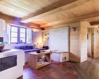 Appartement Getreidekasten im 1. Obergeschoss mit einem Schlafzimmer mit Dusche / WC - Breitbrunn a. Chiemsee - Wohnzimmer