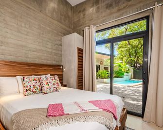 Steps to the Main Surf Break - 3 Bedroom House - Playa Grande - Bedroom