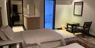 Delmon Hotel Suites - Jeddah - Bedroom