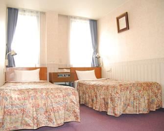 Station Business Hotel Tenshukaku - Hitoyoshi - Ložnice