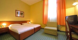 Hotel Central - Osijek - Camera da letto