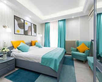 Relax Comfort Suites - Bucharest - Phòng ngủ