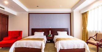 Hafree Hotel - Zhanjiang - Bedroom