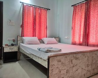 Niloy guest House - Bolpur - Habitación