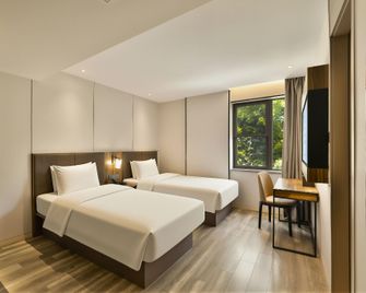 Home Inn Plus Hangzhou West Lake Lakeside Hefang Pedestrian Street - Hangzhou - Habitación