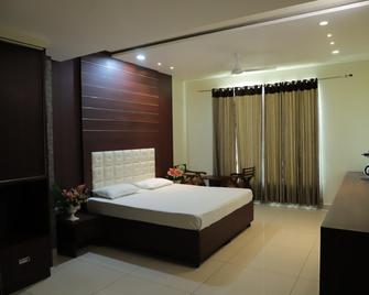 Rutbah Hotel And Restaurant - Mandi Gobindgarh - Bedroom