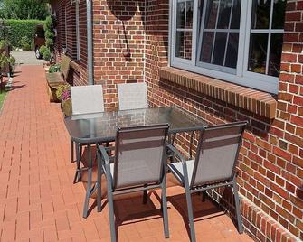 Cozy vacation apartment, pet friendly, ideal for families. Children, - Esens - Innenhof