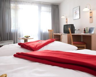 Behringers Freizeit - und Tagungshotel - Gößweinstein - Slaapkamer