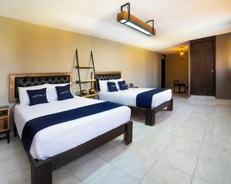 Capital O Hotel Diez - Celaya - Спальня
